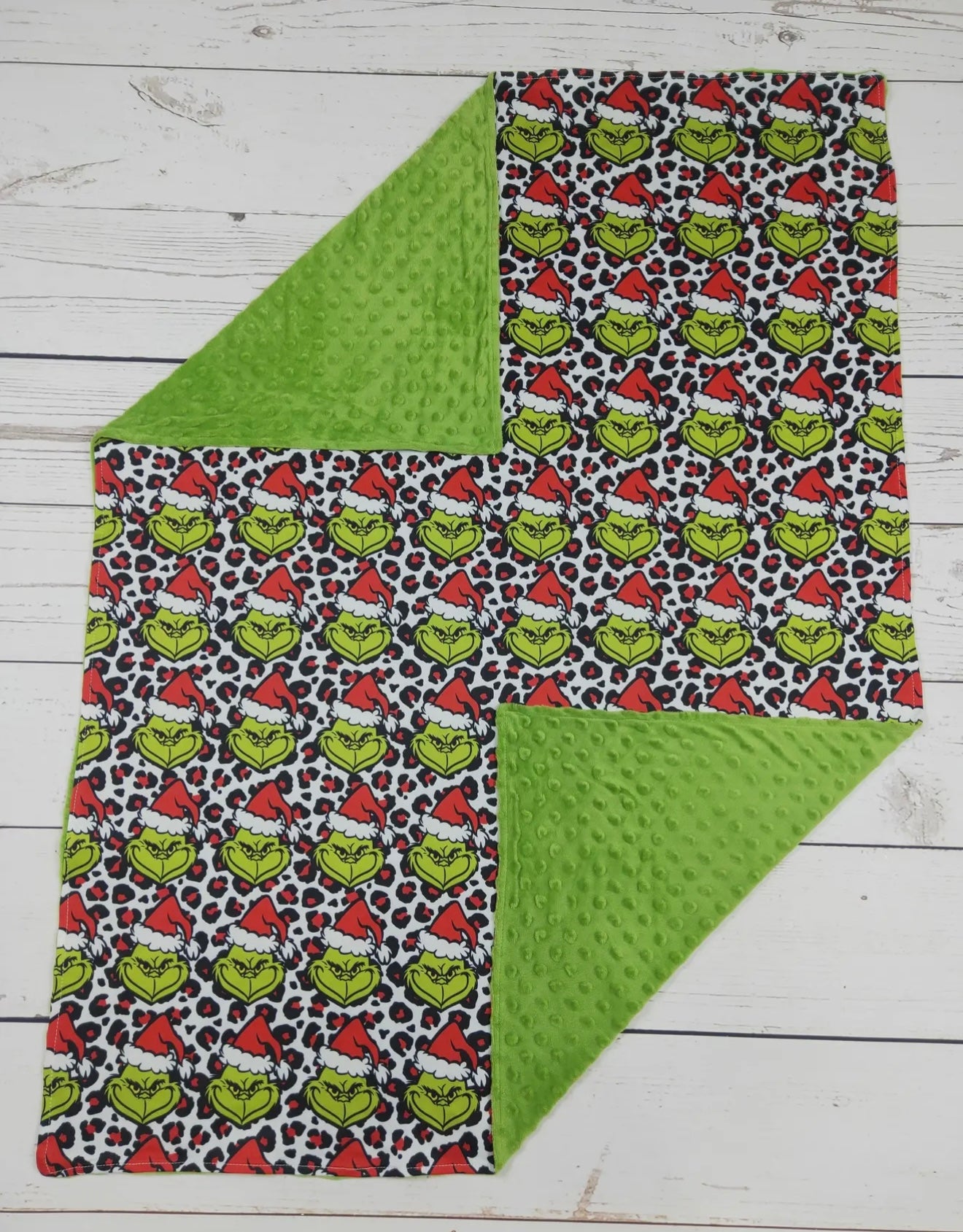 Red and Green Grinch Cheetah Blanket